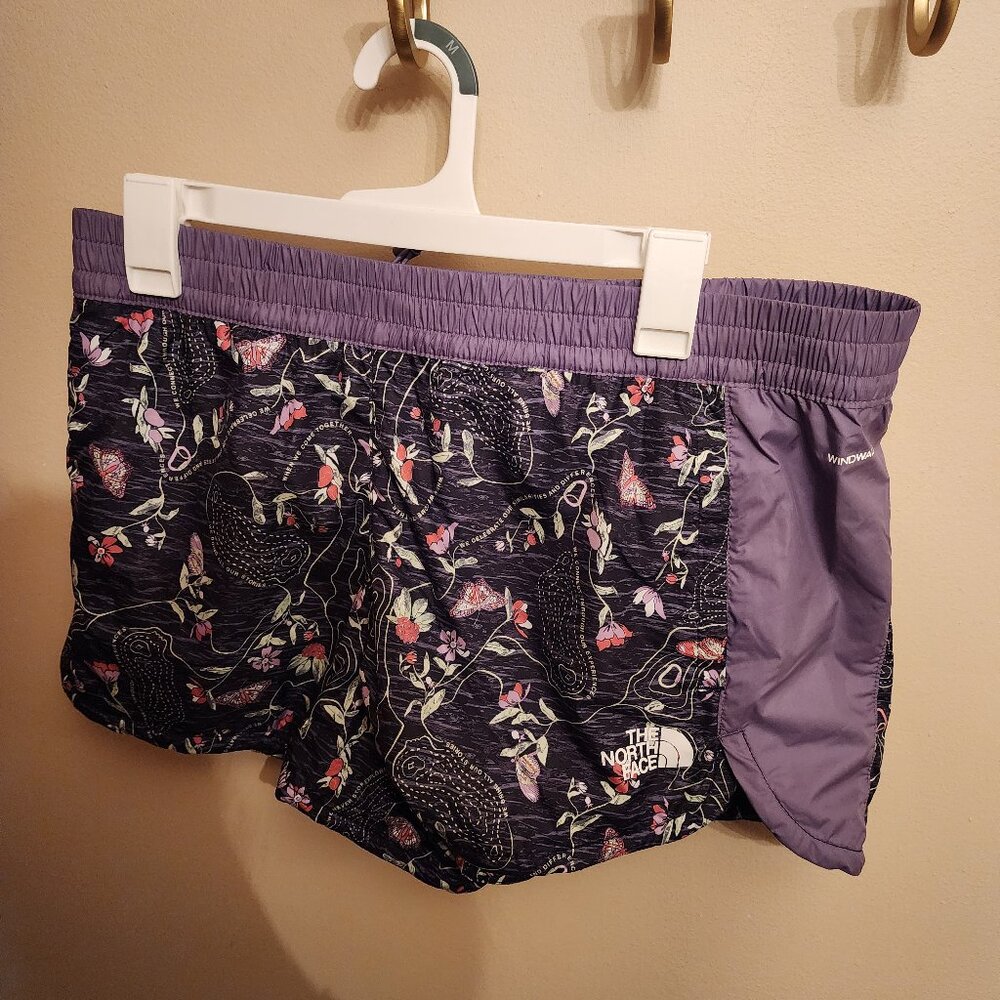 purple north face running shorts medium/large